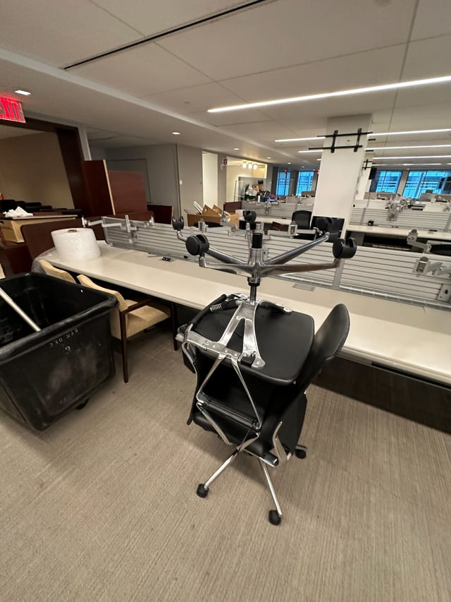 Open-plan office workstations installed and aligned